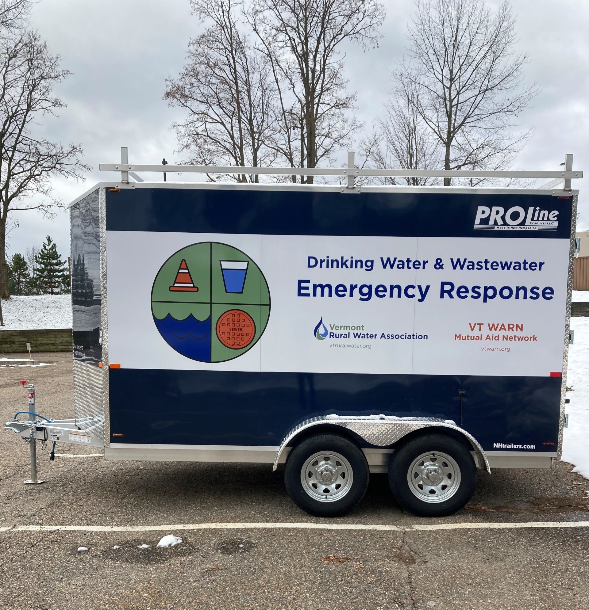 Navy blue trailer that says "Drinking Water & Wastewater Emergency Response"